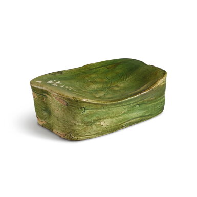 View full screen - View 1 of Lot 21. A rare carved green-glazed 'floral' pillow, Northern Song / Jin dynasty | 北宋 / 金 綠釉刻花枕.