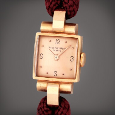 View full screen - View 1 of Lot 232. A pink gold bracelet watch | Circa 1944.