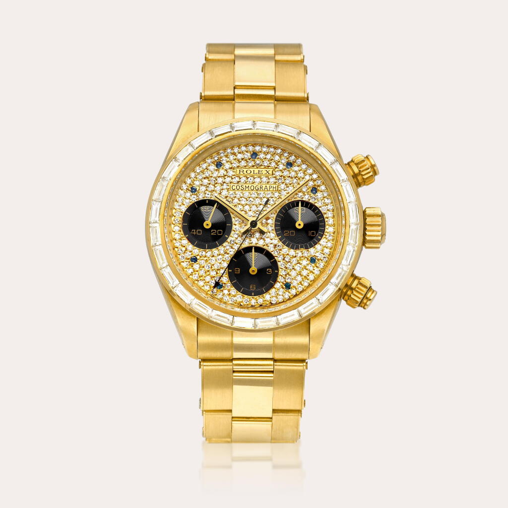 View full screen - View 1 of Lot 2287. Cosmograph Daytona “The King”, Reference 6270 | A highly important yellow gold, diamond and sapphire-set chronograph wristwatch with bracelet, Circa 1985.