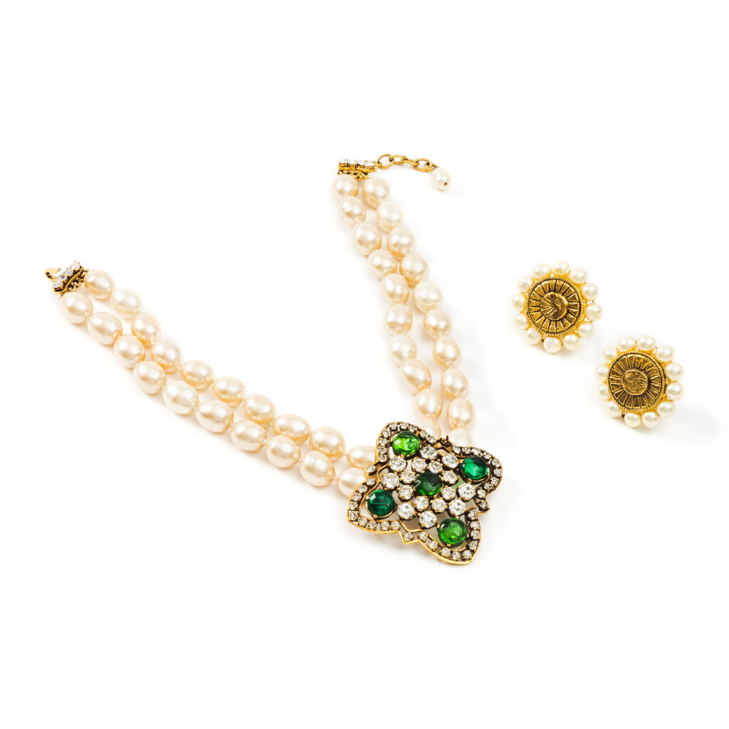 View full screen - View 1 of Lot 334. Set of Two: A Chocker Necklace with Faux Pearls and Green Glass Pendant, ca. 1980 and A Pair of Earrings Clips with Motif of Sun and Moon, ca. 1980.