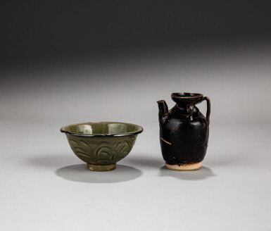 View full screen - View 1 of Lot 3. A small Henan black-glazed ewer and a 'Yaozhou' celadon foliate-rim bowl, Tang - Song dynasty | 唐至宋 河南黑釉小執壺及耀州青釉花口盌一組兩件.
