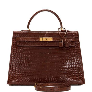 View full screen - View 1 of Lot 36. Hermès Vintage Miel Shiny Crocodile Sellier Kelly 35cm Gold Hardware.