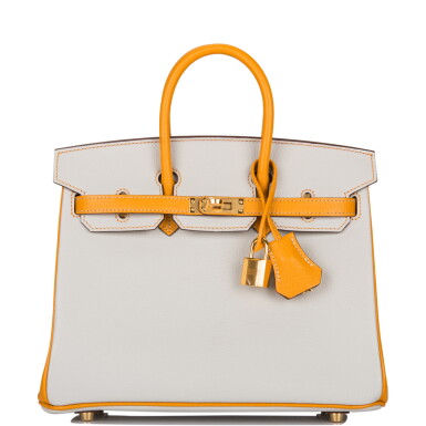 View full screen - View 1 of Lot 59. Hèrmes Horseshoe Stamp (HSS) Bicolor Gris Perle and Moutarde Birkin 25cm of Chevre Leather with Brushed Gold Hardware.