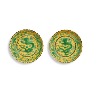 View full screen - View 1 of Lot 523. A pair of yellow-ground green-enameled 'dragon' foliate-rim dishes, Seal marks and period of Qianlong | 清乾隆 黃地綠彩趕珠龍紋花口小盤一對 《大清乾隆年製》款.
