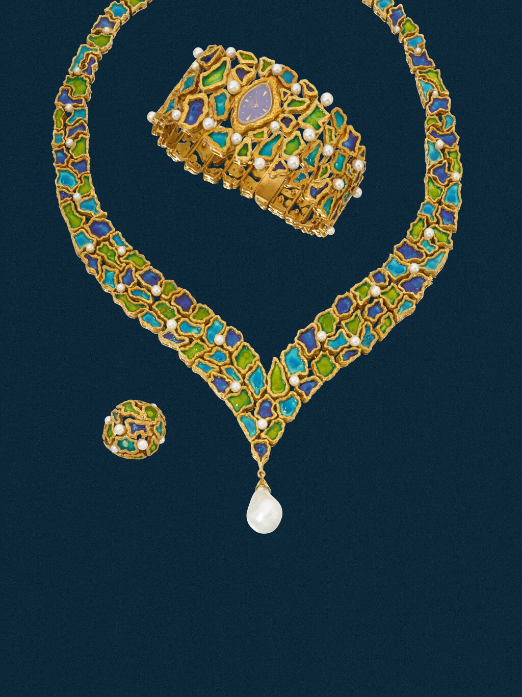 View full screen - View 1 of Lot 24. Reference 3290 | A most likely unique set designed by Gilbert Albert featuring a bracelet watch, a ring and a necklace. Each piece is in yellow gold, decorated with enamel and set with pearls | Made in 1962.