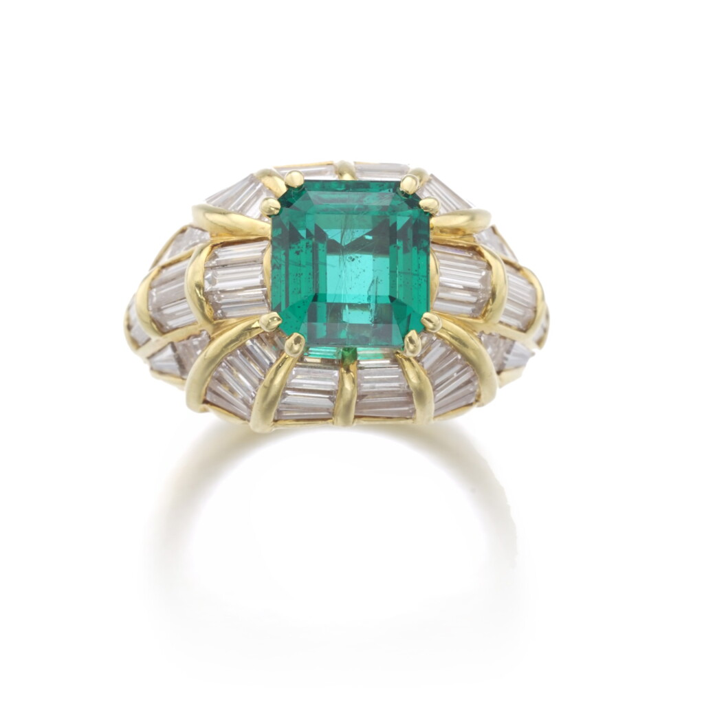 View full screen - View 1 of Lot 180. EMERALD AND DIAMOND RING.