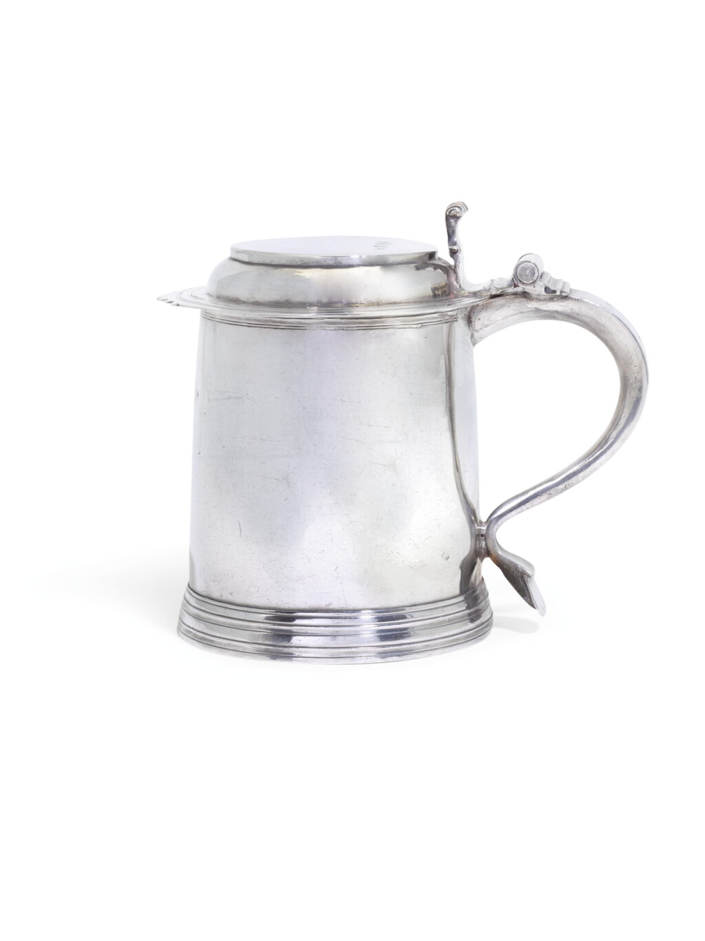 View full screen - View 1 of Lot 173. A Queen Anne Britannia standard silver tankard, maker's mark rubbed, possibly Ralph Leake, London, 1703.