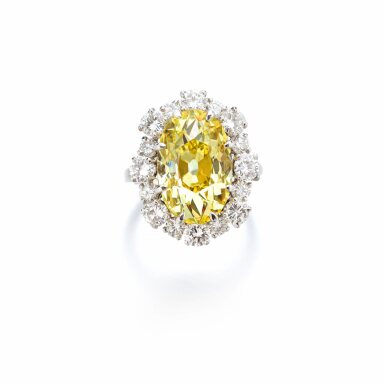 View full screen - View 1 of Lot 714. Fancy Yellow diamond ring.