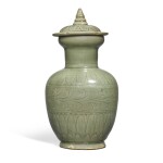 A carved 'Longquan' celadon-glazed funerary vase and cover, Northern Song dynasty | 北宋 龍泉窰青釉塔式瓶連蓋