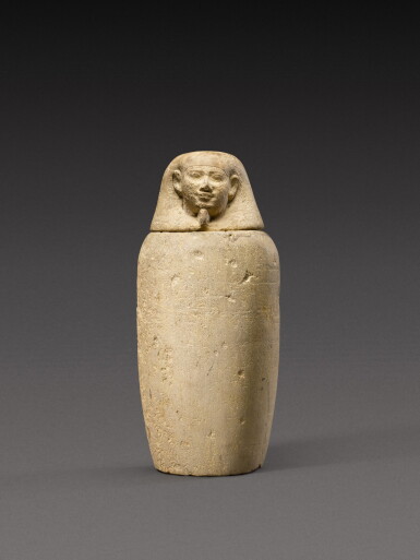 View full screen - View 1 of Lot 135. An Egyptian Limestone Canopic Jar, 26th/30th Dynasty, 664-342 B.C..
