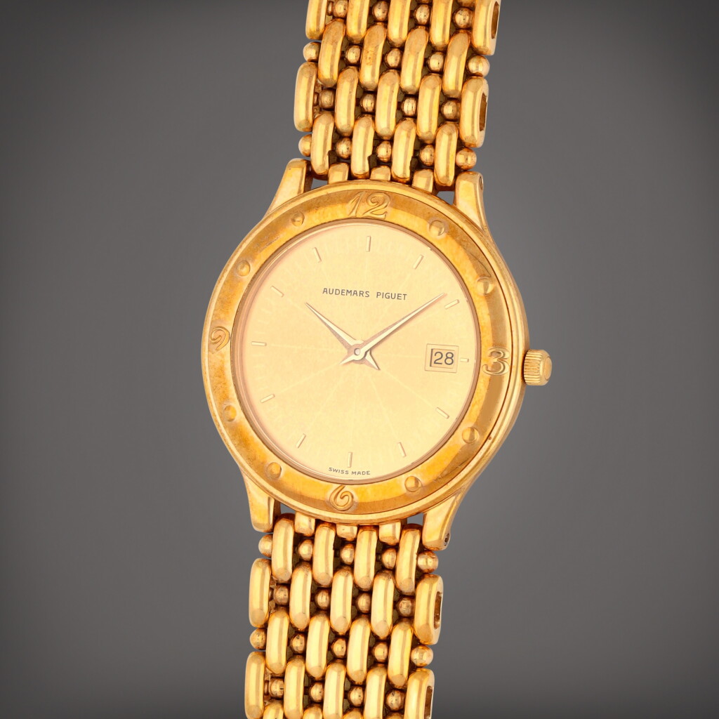 View full screen - View 1 of Lot 378. A yellow gold wristwatch with date and bracelet | Circa 1985 .