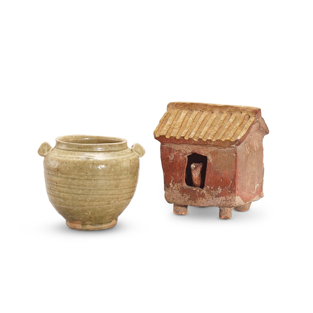 View full screen - View 1 of Lot 403. A celadon-glazed jar, Tang dynasty and a pottery hut, Han dynasty 唐 青釉雙繫罐 及 漢 灰陶彩釉犬倉.