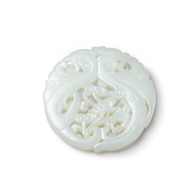 View full screen - View 1 of Lot 213. A reticulated white jade 'phoenix' plaque Qing dynasty, 18th-19th century | 清十八至十九世紀 白玉鏤雕雙鳳紋牌.