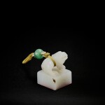 A white jade 'mythical beast' seal, Qing dynasty, 18th - 19th century | 清十八至十九世紀 白玉獸鈕「御書」印