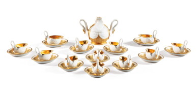 View full screen - View 1 of Lot 135. A Sèvres porcelain part tea service by Dagoty (1771-1840), French Empire, circa 1810 | Partie de service à thé en porcelaine de Paris et biscuit en trompe l'œil d'époque Empire par Dagoty (1771-1840), partiellement doré, d'après un modèle de la Manufacture de Sèvres, vers 1810.