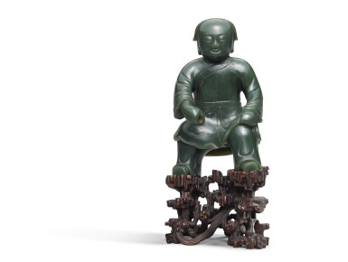 View full screen - View 1 of Lot 228. A spinach jade figure of a boy, Qing Dynasty, 19th century | 清十九世紀 碧玉童子.