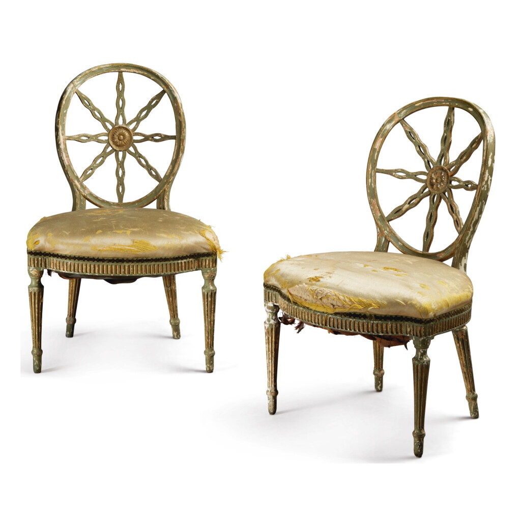 View full screen - View 1 of Lot 332. A PAIR OF GEORGE III GREEN PAINTED WHEEL-BACK SIDE CHAIRS, LATE 18TH CENTURY.