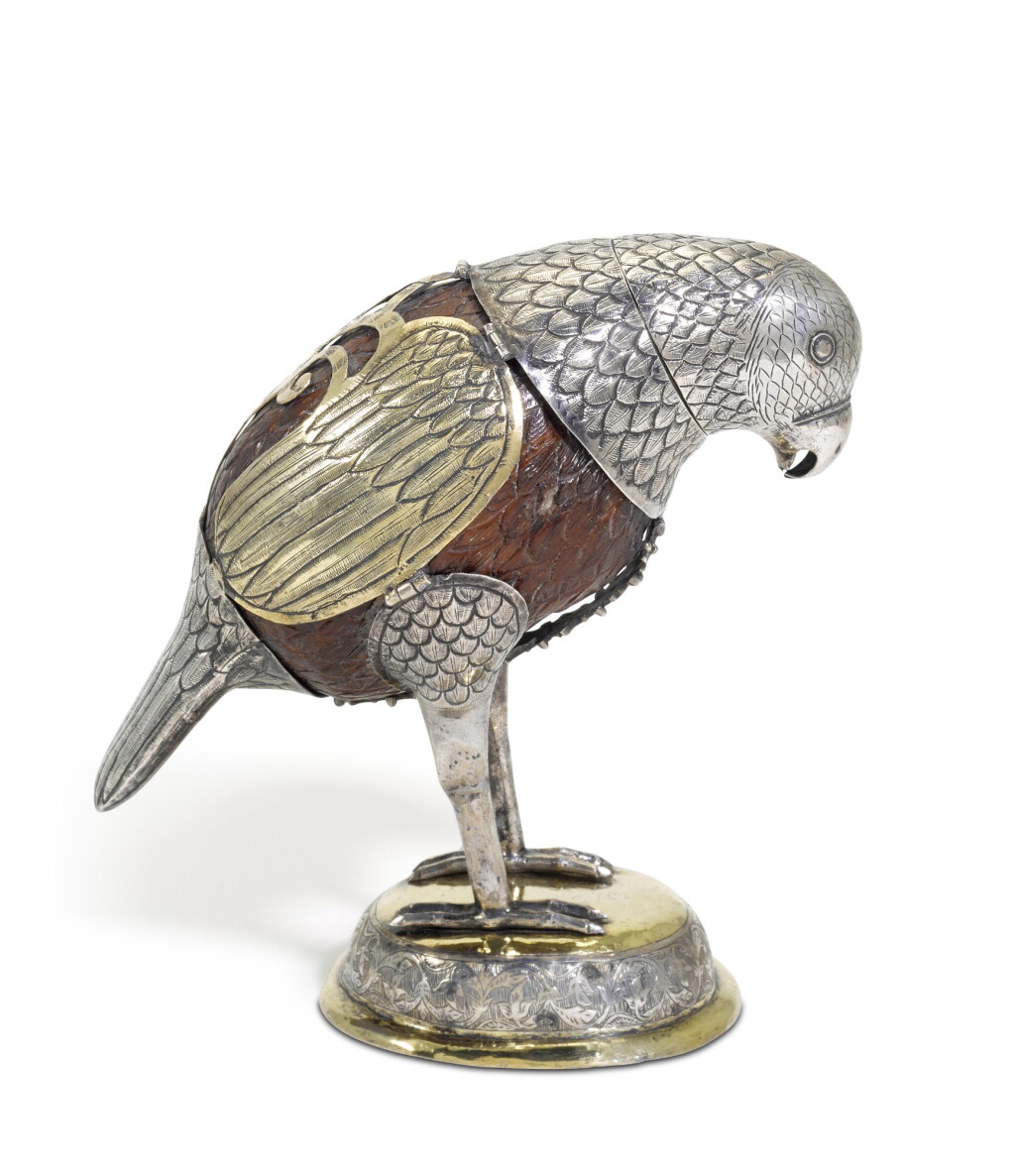 View full screen - View 1 of Lot 43. A continental parcel-gilt silver wood or coconut model of a bird, probably 18th century.