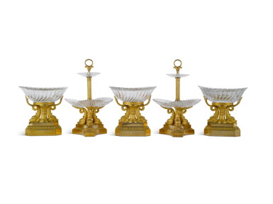 View full screen - View 1 of Lot 95. A Empire Gilt Bronze, Cut and Moulded Glass Five-Piece Surtout De Table in the manner of Thomire, Circa 1815.