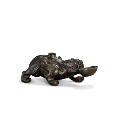 View full screen - View 1 of Lot 5643. A bronze 'mythical beast' water dropper, Six dynasties | 六朝 銅瑞獸形硯滴.