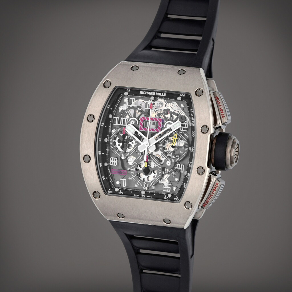 View full screen - View 1 of Lot 141. Reference RM011 AH WG ‘Felipe Massa’ | A white gold and titanium semi-skeletonised annual calendar flyback chronograph wristwatch with digital date display, Circa 2011.