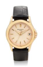 PATEK PHILIPPE | CALATRAVA, REFERENCE 5107, A YELLOW GOLD WRISTWATCH WITH DATE, CIRCA 2008