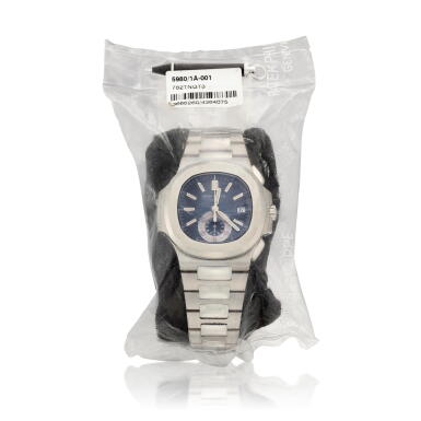 View full screen - View 1 of Lot 2122. Nautilus, Reference 5980 | A stainless steel flyback chronograph bracelet watch with date in single factory seal, Circa 2007 | 百達翡麗 | Nautilus 型號5980 | 精鋼飛返計時鏈帶腕錶,備日期顯示,原廠未開封,約2007年製.