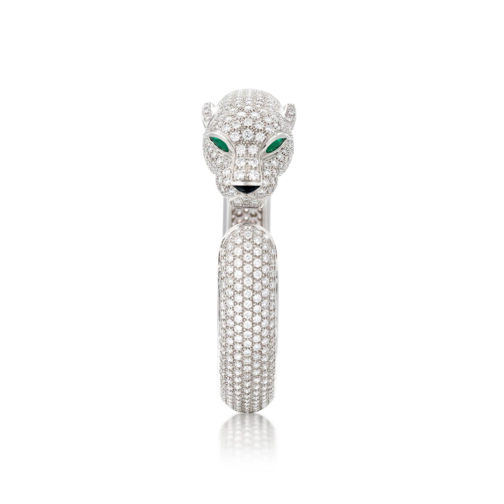 View full screen - View 1 of Lot 258. Emerald, onyx and diamond bangle, 'Panther' | Bracciale in smeraldi, onice e diamanti, 'Panther'.