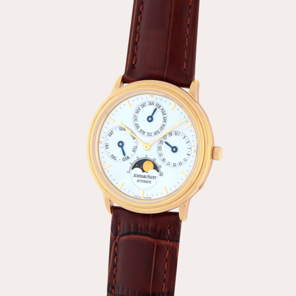 View full screen - View 1 of Lot 5. Quantième Perpétuel Automatique, Reference 5548BA | A yellow gold perpetual calendar wristwatch with moon phases | Circa 1983.