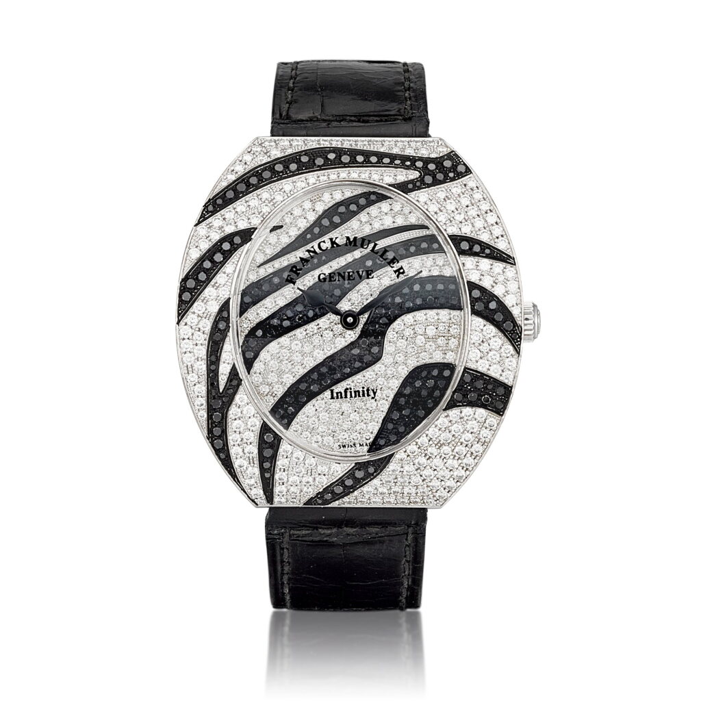 View full screen - View 1 of Lot 8626. Infinity Safari, Reference 3640 QZ SAFARI D CD | A white gold, diamond and black diamond-set wristwatch, Circa 2009 | Infinity Safari 型號3640 QZ SAFARI D CD | 白金鑲鑽石及黑鑽腕錶,約2009年製.