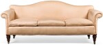 A Victorian walnut and upholstered 'camel-back' sofa, circa 1880, manner of Howard & Sons