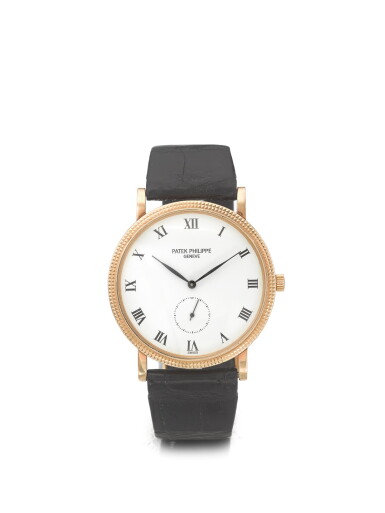 View full screen - View 1 of Lot 174. PATEK PHILIPPE | REF 3919J, A YELLOW GOLD WRISTWATCH MADE IN 1991.