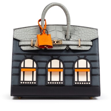 View full screen - View 1 of Lot 316. Limited Edition Ciment Matte Mississippiensis Alligator, Gris Misty and Craie Epsom, Orange H and Black Swift Rainy Days Faubourg Birkin 20 Sellier Permabrass Hardware, 2024.
