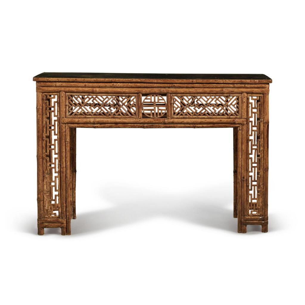 View full screen - View 1 of Lot 753. A bamboo and black-lacquered side table, Qing dynasty, 18th / 19th century | 清十八 / 十九世紀 竹配黑漆面長方桌.