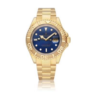 View full screen - View 1 of Lot 229. Reference 16628B Yacht-Master | A yellow gold automatic wristwatch with date and bracelet, Circa 1999.