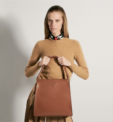 View full screen - View 1 of Lot 27. PRADA | LOUISE LEATHER TOTE, WORN BY LEXI BOLING.