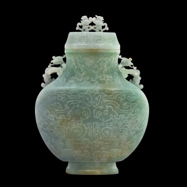 View full screen - View 1 of Lot 103. A massive jadeite archaistic 'phoenix' vase and cover, Qing dynasty | 清 翠玉鳳紋雙鳳耳帶蓋大扁壺.