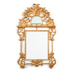 A Louis XV giltwood mirror, circa 1750 | Miroir à parecloses en bois doré d'époque Louis XV, vers 1750