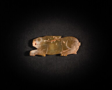 View full screen - View 1 of Lot 80. A green jade 'rabbit' pendant, early Western Zhou dynasty | 西周初 玉雕兔形珮.