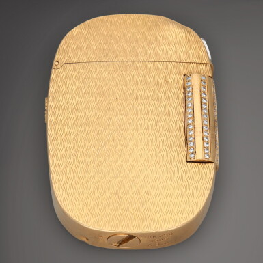 View full screen - View 1 of Lot 279. Golden Ellipse 'Chevrons', Reference 9505 | A yellow gold and diamond-set lighter | Circa 1980.