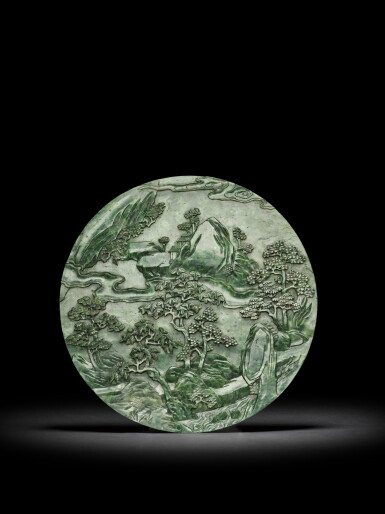 View full screen - View 1 of Lot 9. A spinach-green jade 'landscape' circular table screen, Qing dynasty, Qianlong period | 清乾隆 碧玉山水紋圓插屏.