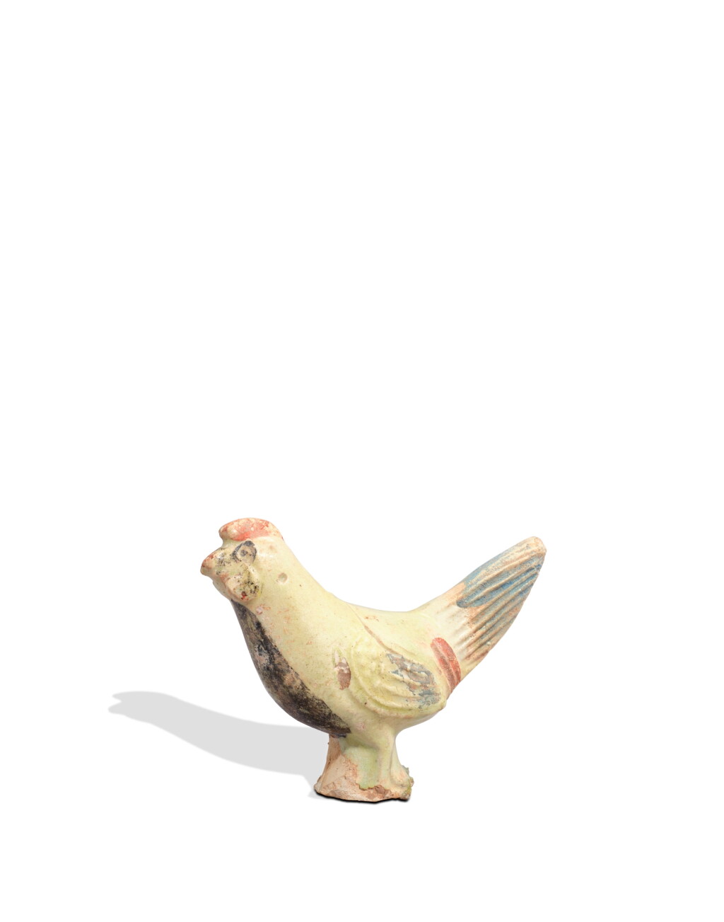 View full screen - View 1 of Lot 5144. A small green-glazed and painted pottery figure of a rooster, Tang dynasty | 唐 綠釉陶加彩公雞.