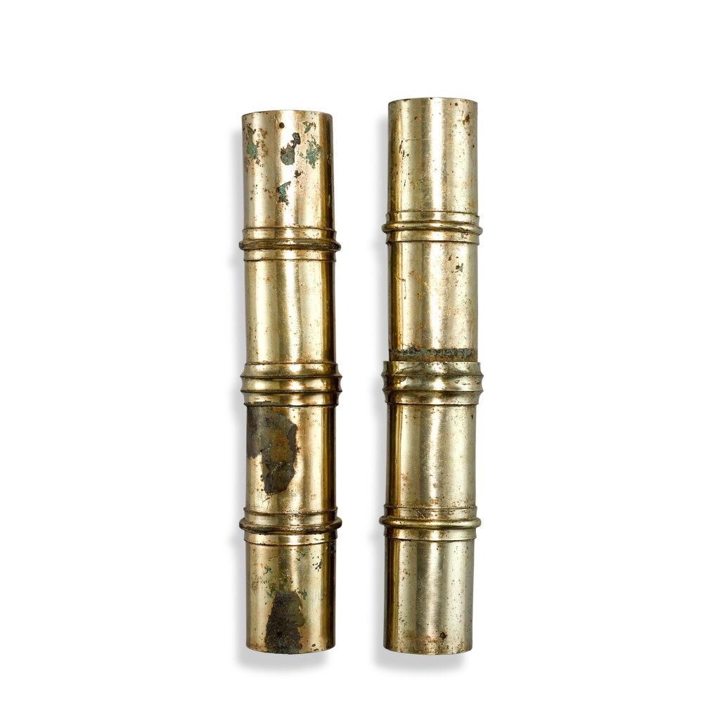 View full screen - View 1 of Lot 533. A pair of gilt-bronze chariot canopy shaft fittings, Han dynasty 漢 銅鎏金馬車傘柄飾件一對.
