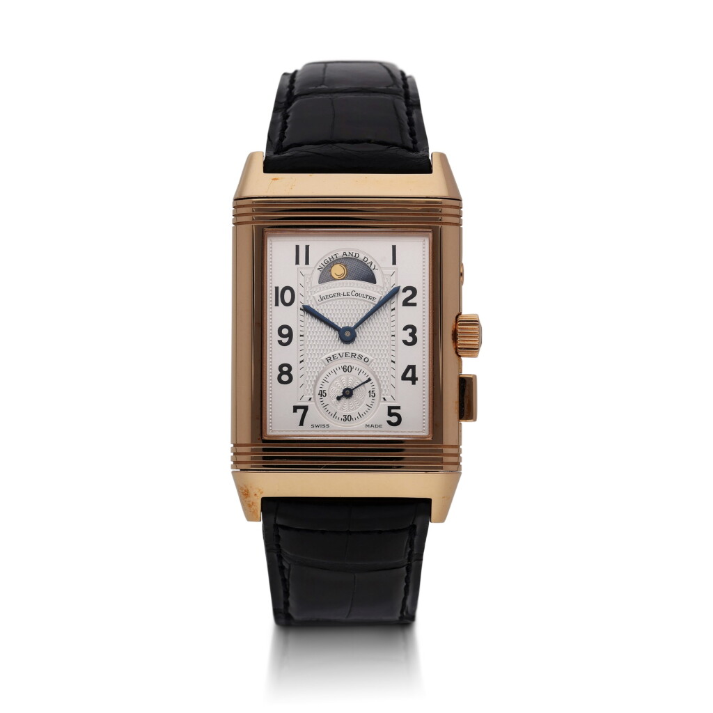 View full screen - View 1 of Lot 406. Reference 270.2.58 Reverso Geographique | A limited edition pink gold dual time reversible wristwatch with moon phases, power reserve, and day/night indication, Circa 1999.