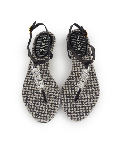 View full screen - View 1 of Lot 15. CHANEL | BLACK AND WHITE PVC AND LEATHER FLATS .