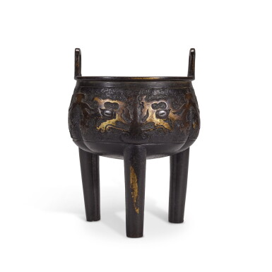 View full screen - View 1 of Lot 349. An archaistic parcel-gilt bronze tripod censer, 17th century | 十七世紀 局部鎏金銅仿古饕餮紋鼎式爐.