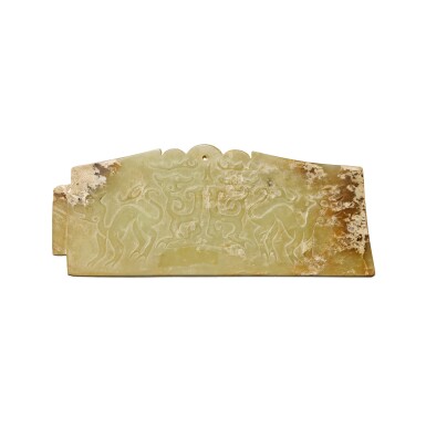 View full screen - View 1 of Lot 25. An archaistic celadon jade plaque carved with stylised mythical beasts | 仿古青玉瑞獸紋牌飾.