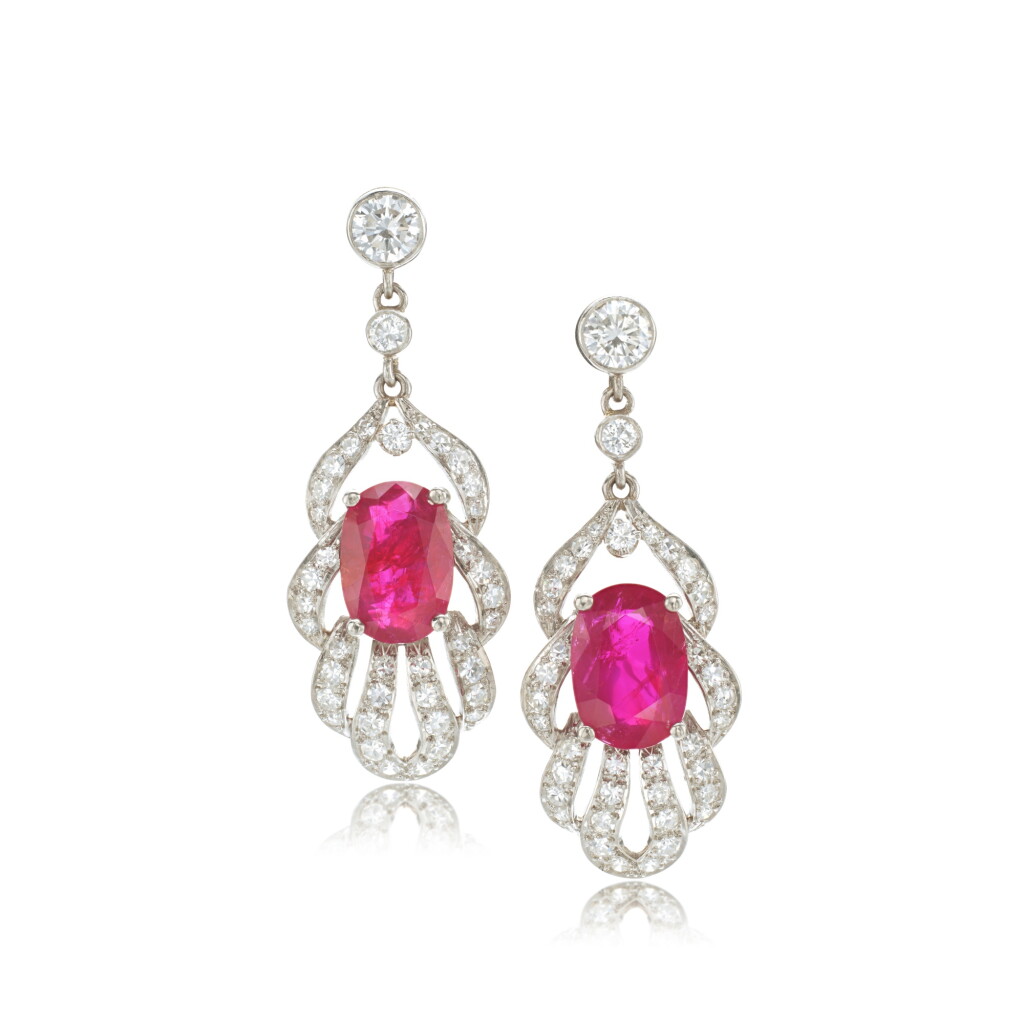 View full screen - View 1 of Lot 894. Pair of ruby and diamond pendent earrings.