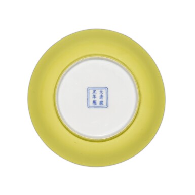 View full screen - View 1 of Lot 1. A small lemon-yellow glazed dish, Mark and period of Yongzheng | 清雍正 檸檬黃釉盤 《大清雍正年製》款.