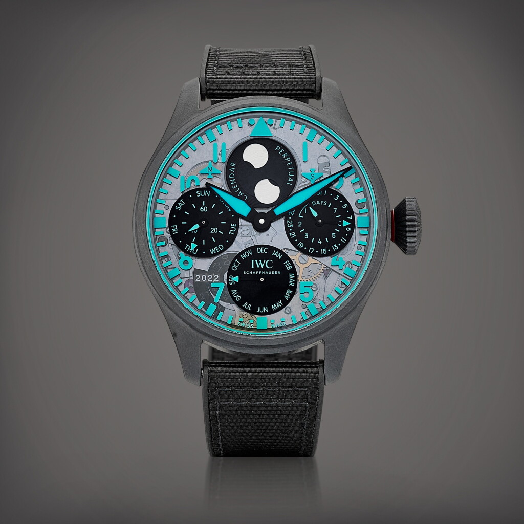 View full screen - View 1 of Lot 2217. Big Pilot's Watch Perpetual Calendar Edition 'Toto Wolff x Mercedes-AMG Petronas Formula One™ Team' | A limited edition ceratanium semi-skeletonised perpetual calendar wristwatch with moon phases, digital year display and power reserve indication, Circa 2022 | 萬國 | 大型飛行員萬年曆系列 ‘TOTO WOLFF X MERCEDES-AMG PETRONAS FORMULA ONE™ TEAM’ | 限量版瓷化鈦金屬半鏤空萬年曆腕錶,備月相、數位年份及動力儲備顯示,約2022年製.